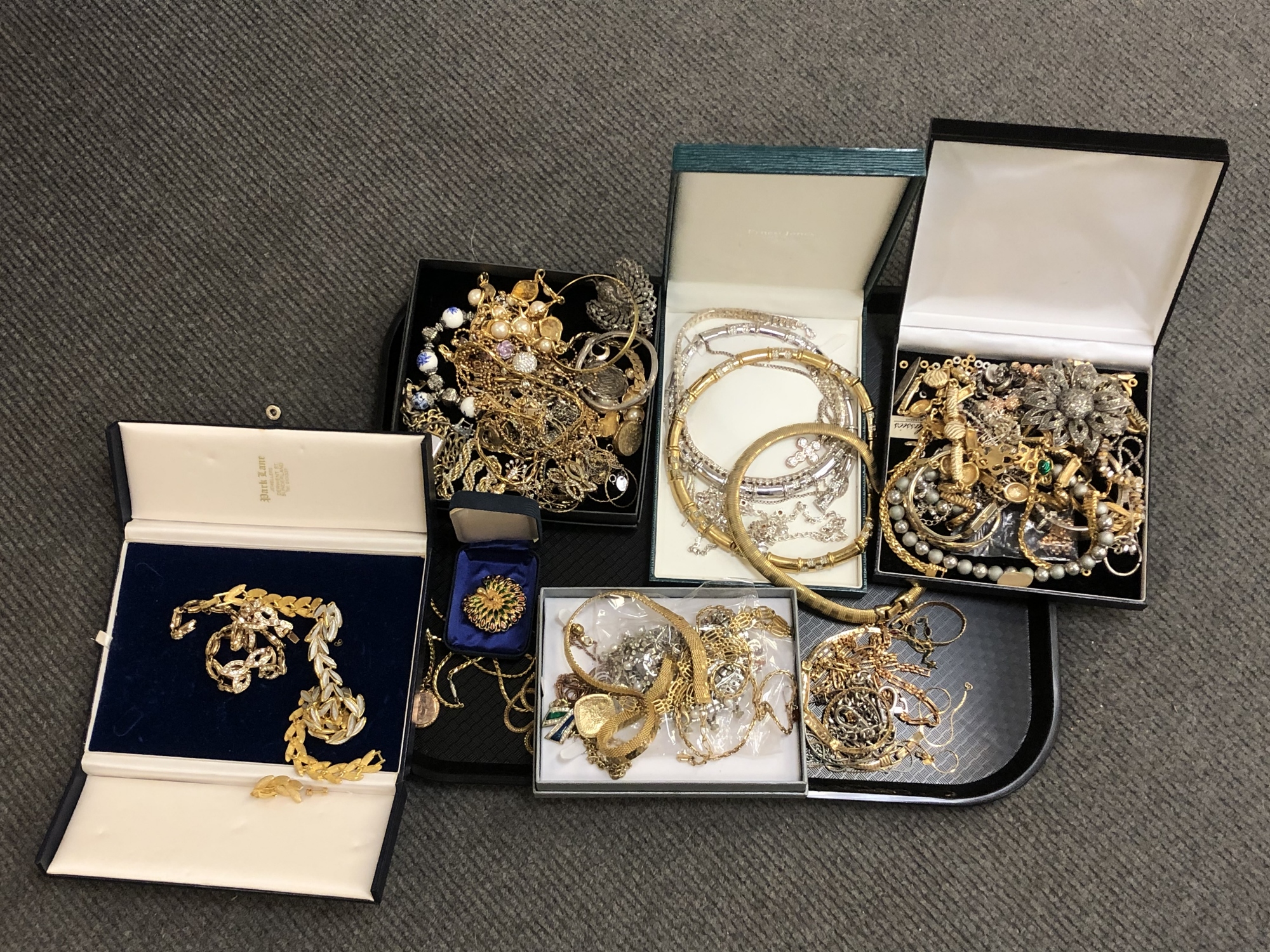 A tray of a large quantity of gilt costume jewellery; necklaces, chains,