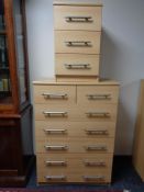 A pine effect seven drawer chest and matching bedside chest