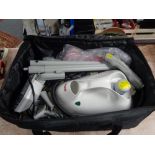 A Polti Vaporetto 950 steam cleaner with accessories in carry bag