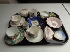 A tray of antique china cups and saucers to include Aynsley moustache cups, Shelley shell dish,