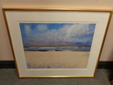 A gilt framed signed limited edition print of an estuary,