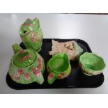 A four piece Melba ware floral pattern tea service together with a Sylvac wall pocket