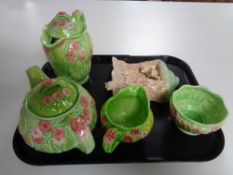 A four piece Melba ware floral pattern tea service together with a Sylvac wall pocket