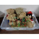 A collection of modern teddy bears and soft toys.