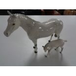 Two Beswick figures, grey dapple horse with foal.