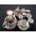 A tray of twenty-nine pieces of Victorian tea china