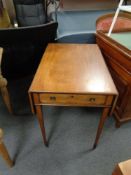 A 19th century mahogany Sutherland table fitted a drawer