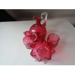 Four pieces of antique cranberry glass ware (a/f)