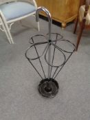 A 20th century ceramic and metal umbrella stand in the form of an umbrella