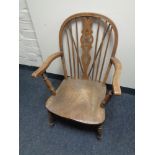 An em Windsor style kitchen armchair