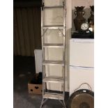 An aluminium three way ladder