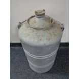 A 20th century galvanized canister with carry handle