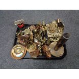 A tray of brass ornaments, trivets,