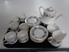 A tray containing a twenty one piece Paragon Cheswell tea service