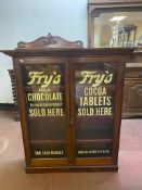 A Victorian mahogany double door bookcase bearing Fry's advertisement CONDITION REPORT: