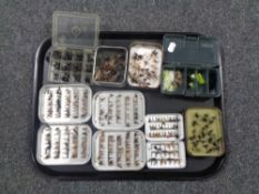 A tray of large quantity of fishing flies in tins and boxes