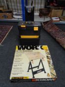 A boxed Worx high tilt work bench, rolling tool chest of spanners,