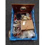 A crate of a large quantity of costume jewellery, wooden trinket box, lady's wristwatches,