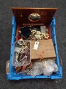 A crate of a large quantity of costume jewellery, wooden trinket box, lady's wristwatches,