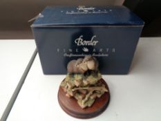 A Border Fine Arts figure 'Together Again' on wooden stand,