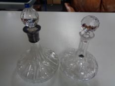 An Edinburgh Crystal ship's decanter with stopper together with one other