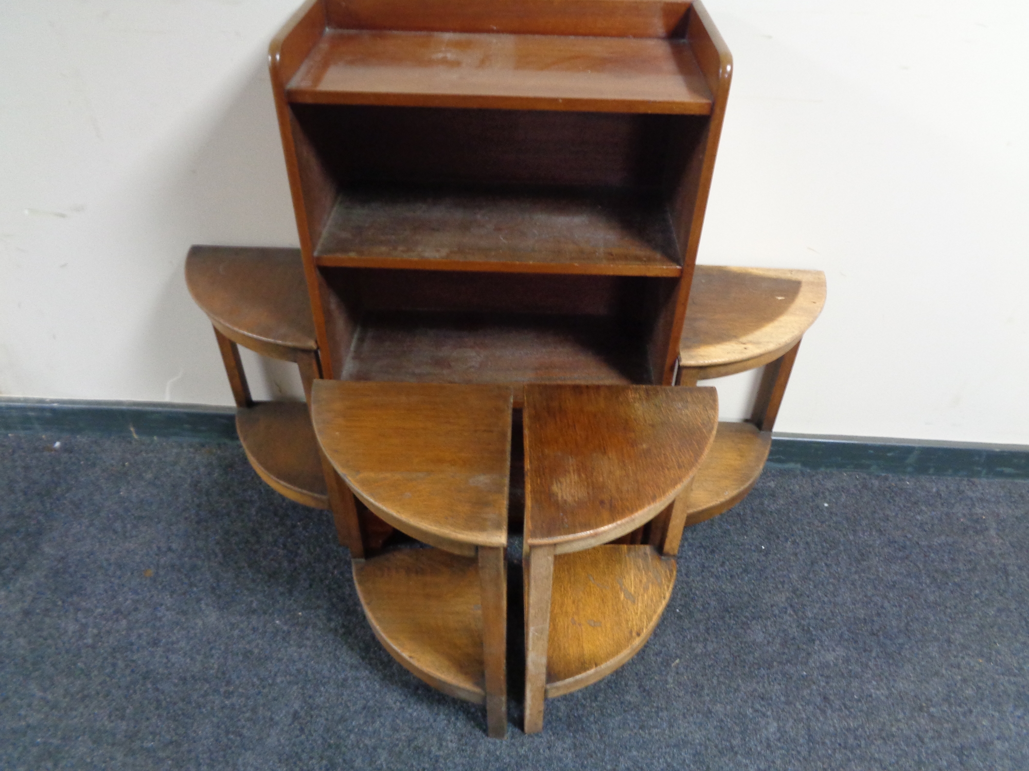 A set of 20th century mahogany open shelves and two corner what not stands