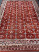 An Afghan design carpet 340 cm x 240 cm