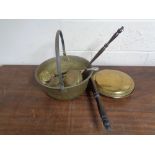 A brass handled jam pan, bed warming pan,