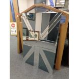 A contemporary Union Jack frameless mirror CONDITION REPORT: Very small and minor