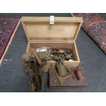 A plywood tool box of hard ware, oil cans, vintage blow lamp,