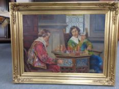 A continental school gilt framed oil on canvas, two figures in period dress playing chess,