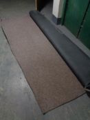 A piece of brown hard wearing office style carpet