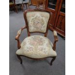 A French style salon armchair upholstered in tapestry fabric