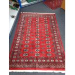 A Tekke rug, 206cm by 138cm CONDITION REPORT: This is machine made.