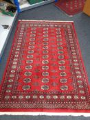 A Tekke rug, 206cm by 138cm CONDITION REPORT: This is machine made.