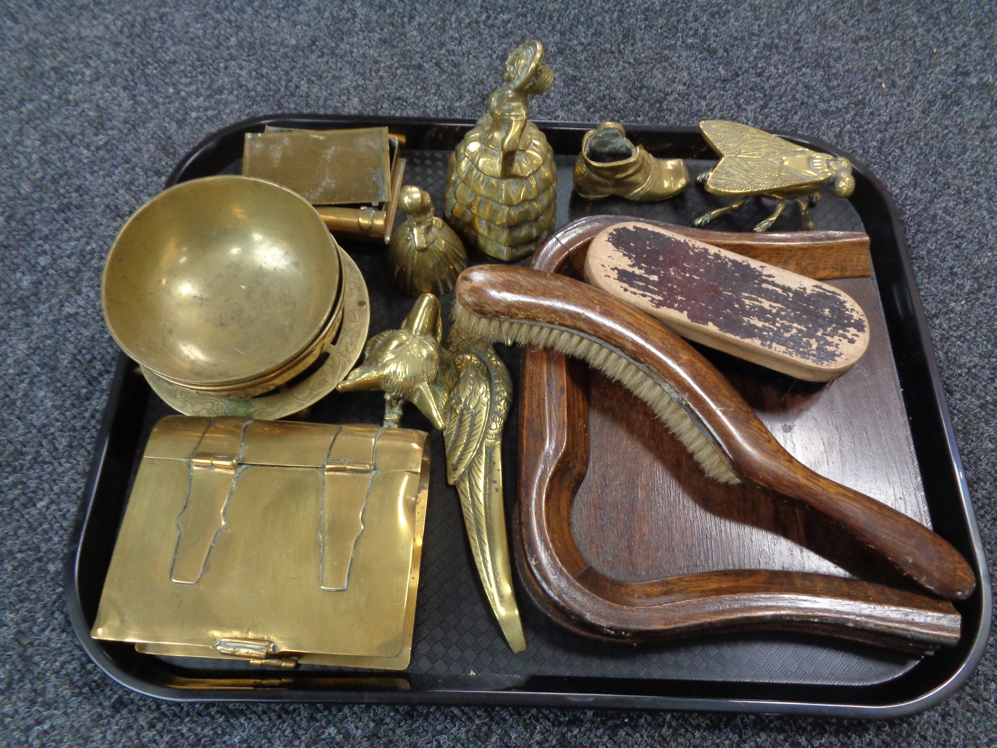A tray of assorted brass ware to included trinket box in the form of a book, Eastern dishes,