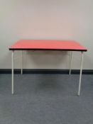 A mid 20th century folding Formica topped kitchen table