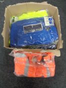 A box of work clothes - florescent jackets