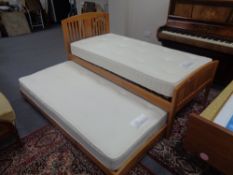 A M&S 3' bed with pull out trundle bed,