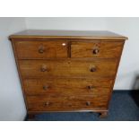 A Victorian mahogany five drawer chest