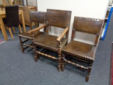 A set of six 20th century oak brown button leather chairs CONDITION REPORT: This is