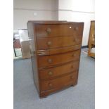 A 1930's oak five drawer bowfronted chest