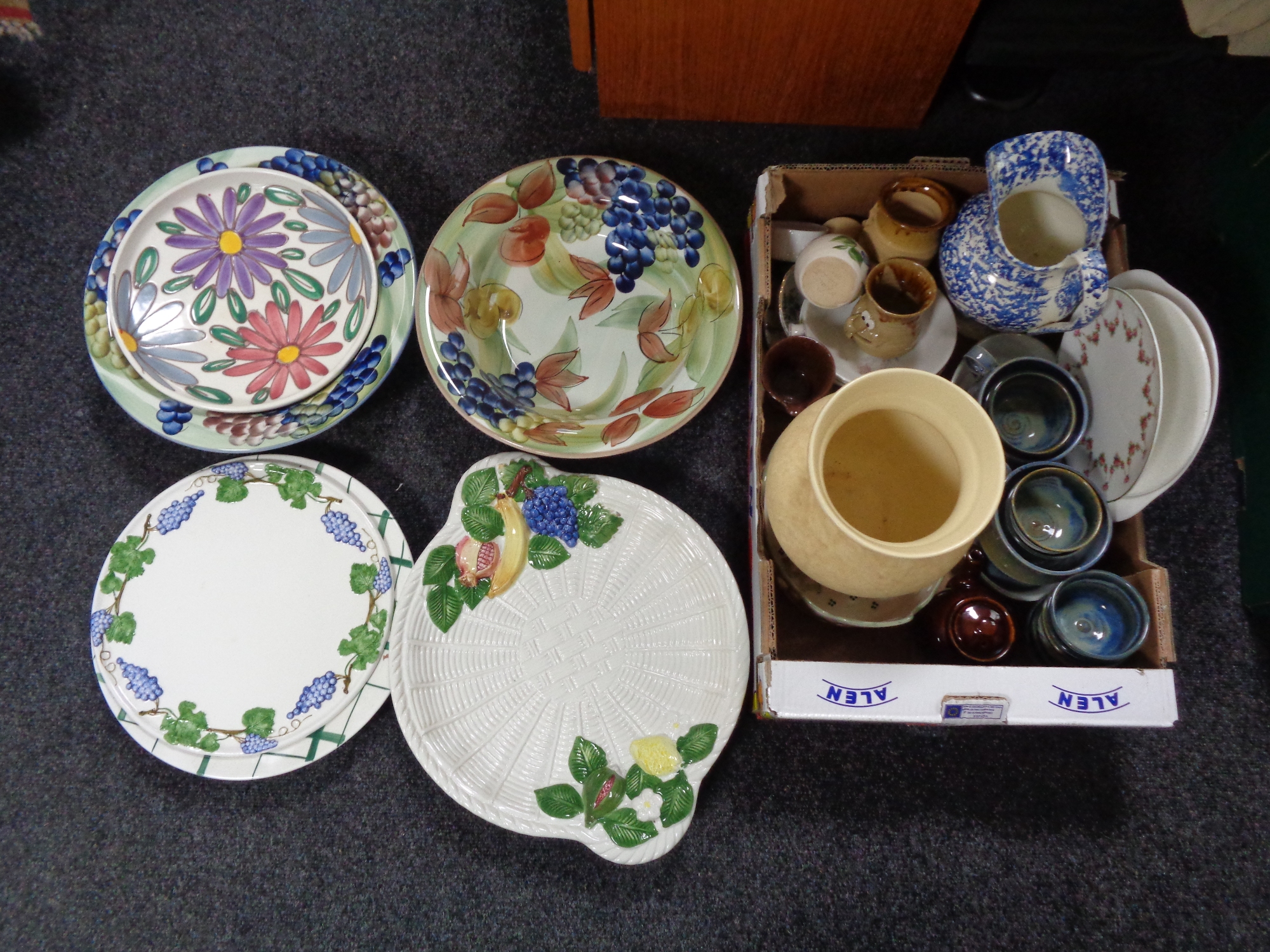 A quantity of continental bowls and plates together with a further box of pottery vase, mugs,