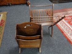 An oak magazine rack and a folding magazine rack