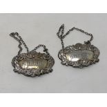 Two silver decanter labels 'Whisky' and 'Sherry',