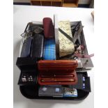 A tray of large quantity of reading glasses, pens in wooden box, tie and cuff link sets,