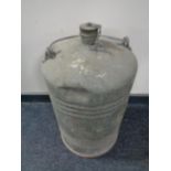 A 20th century galvanized canister with carry handle