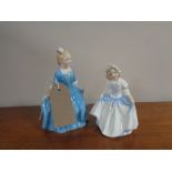Two Royal Doulton figures, a child from Williamsburg, HN 2154 and Dinky Doo,