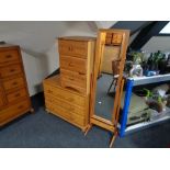 A three drawer pine chest,
