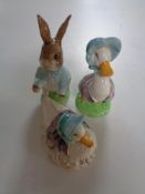 Three Beswick Beatrix Potter figures;